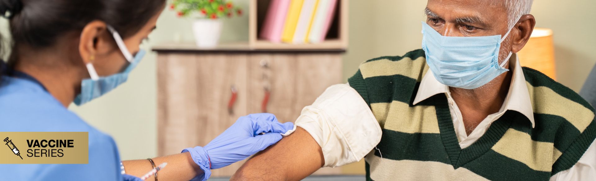 An older man gets his vaccine